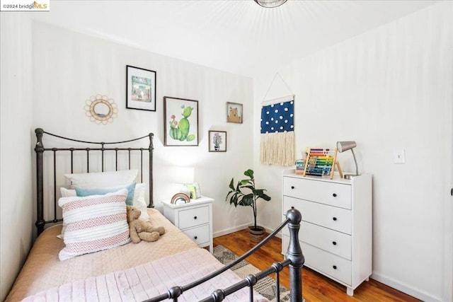 bedroom featuring light hardwood / wood-style floors