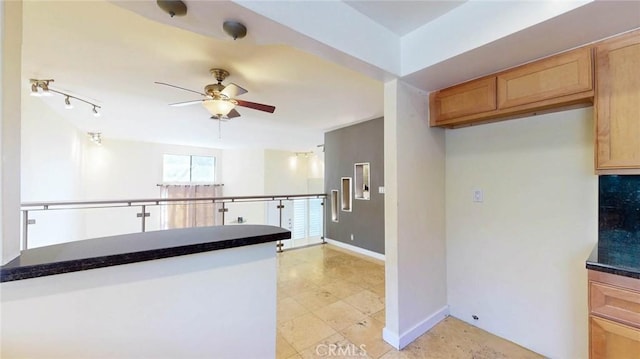 kitchen featuring ceiling fan