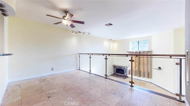 empty room with ceiling fan