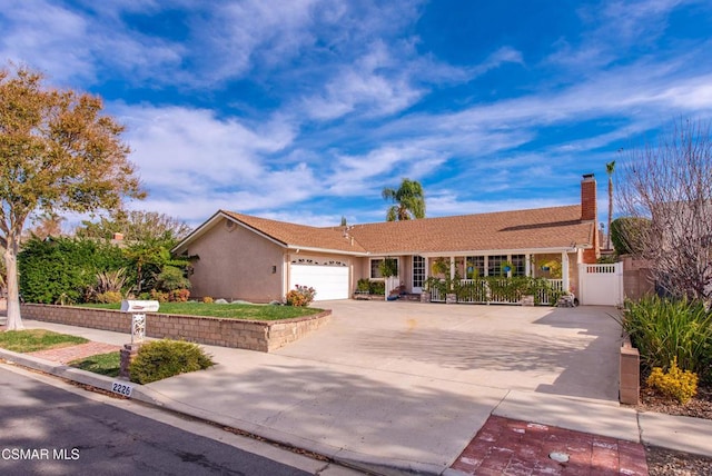 single story home featuring a garage