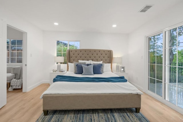 bedroom with light hardwood / wood-style floors