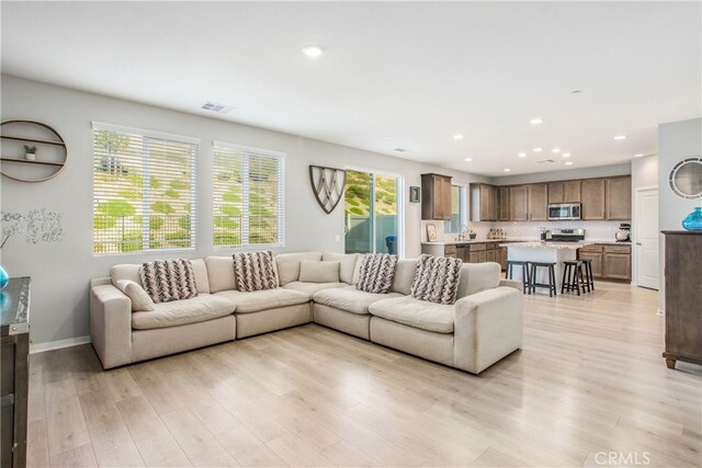 living room featuring light hardwood / wood-style floors