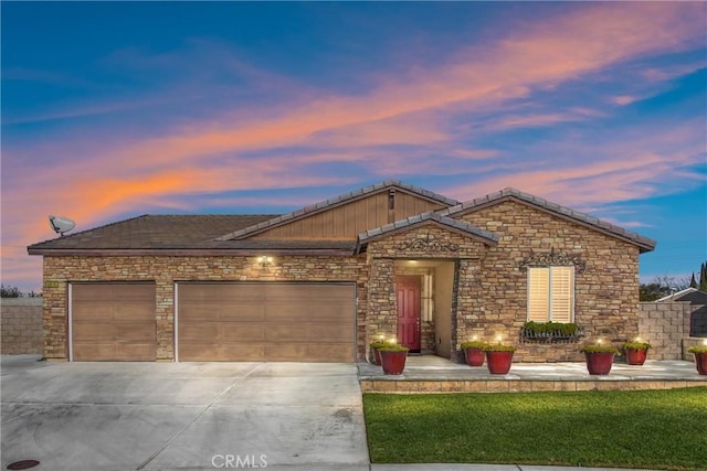 single story home featuring a garage