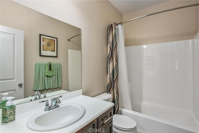 full bathroom with vanity, toilet, and shower / bath combo with shower curtain