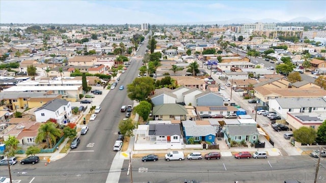 drone / aerial view featuring a mountain view