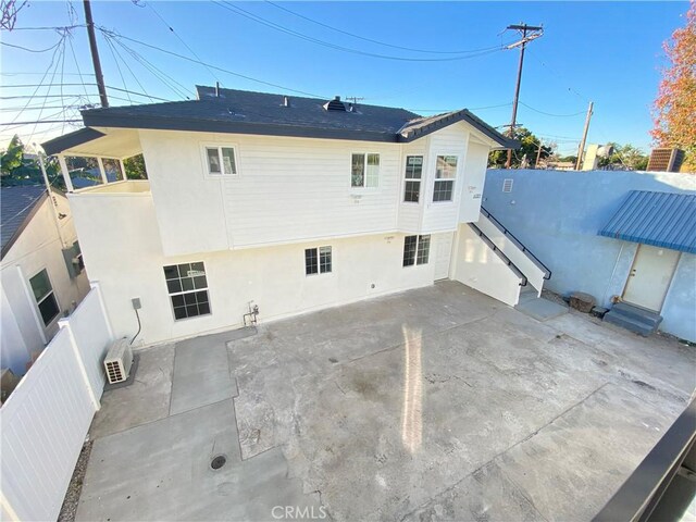 rear view of house featuring a patio