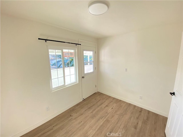 empty room featuring light wood-type flooring