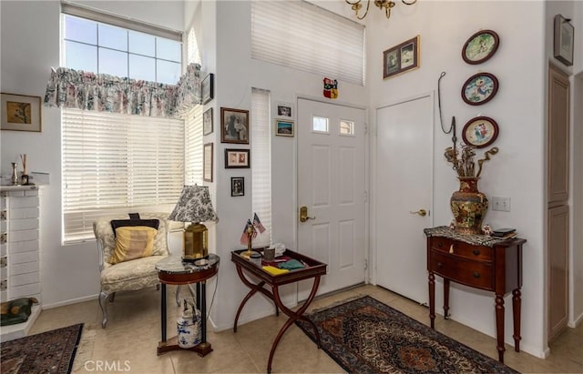 foyer entrance featuring light tile patterned floors