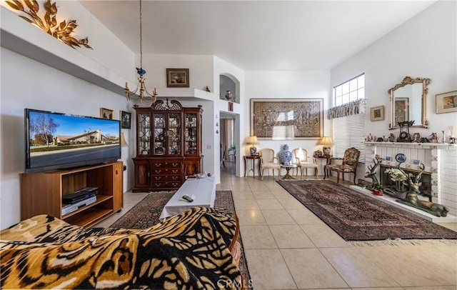 living room with light tile patterned floors and built in features