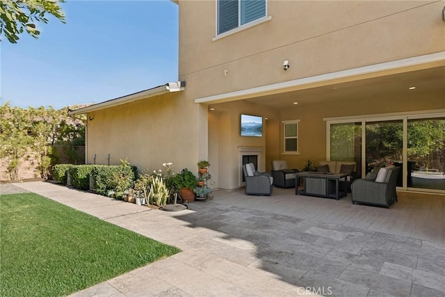 exterior space with an outdoor living space and a patio