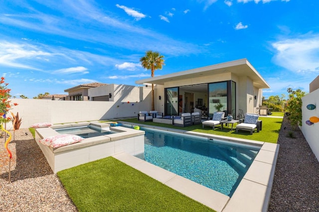 view of pool with an in ground hot tub and outdoor lounge area