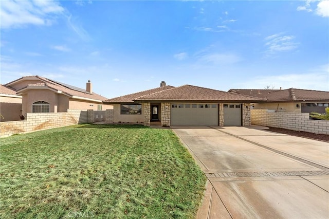 single story home with a front yard and a garage