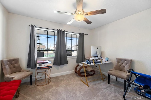 office area featuring ceiling fan and light carpet