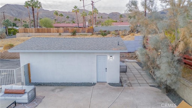 view of outbuilding with a mountain view