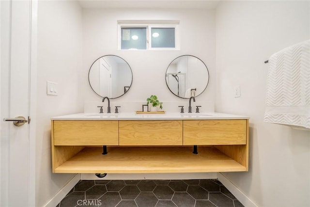 bathroom featuring vanity and tile patterned flooring