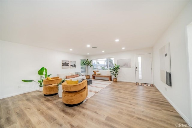 sitting room with light hardwood / wood-style floors