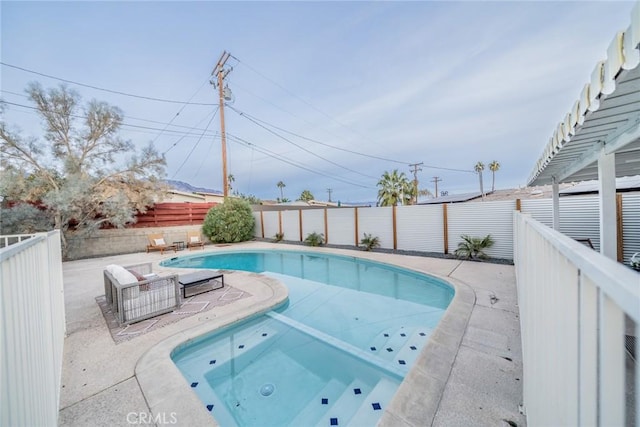 view of swimming pool featuring a patio