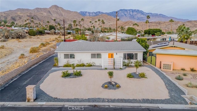 view of front of home with a mountain view