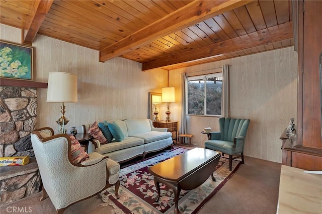 living room with carpet, beam ceiling, and wood ceiling