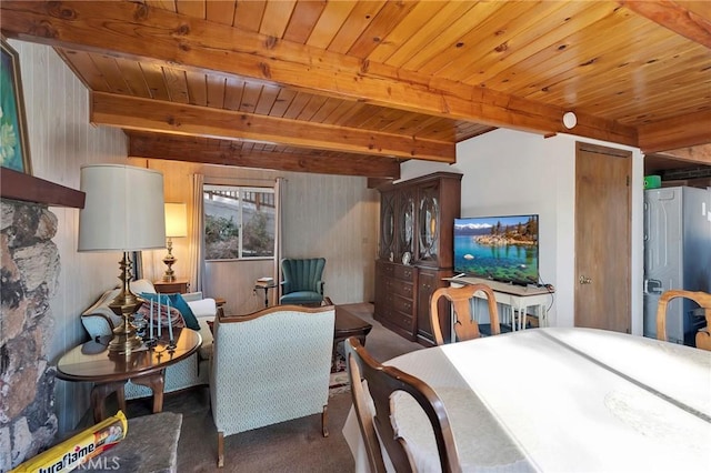 dining room featuring wooden ceiling, beam ceiling, and dark colored carpet