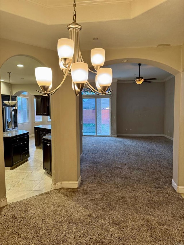 kitchen with stainless steel refrigerator with ice dispenser, light carpet, and ceiling fan with notable chandelier