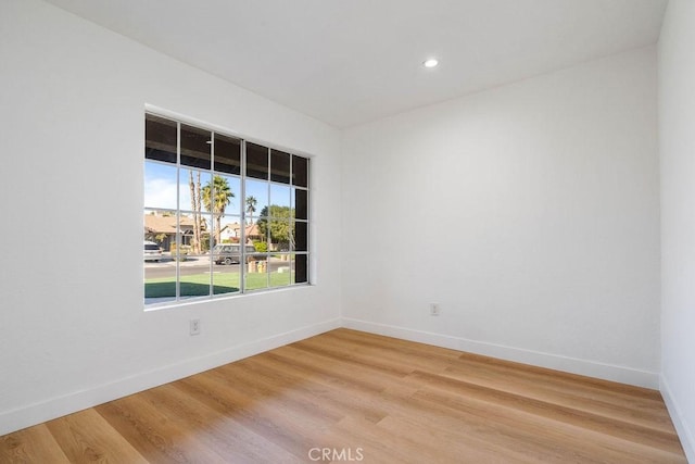 unfurnished room featuring wood-type flooring