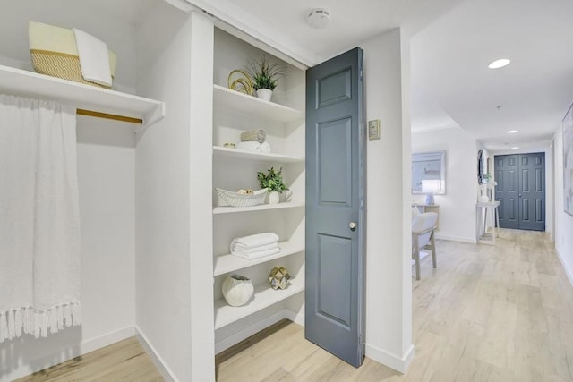 hall featuring light hardwood / wood-style flooring