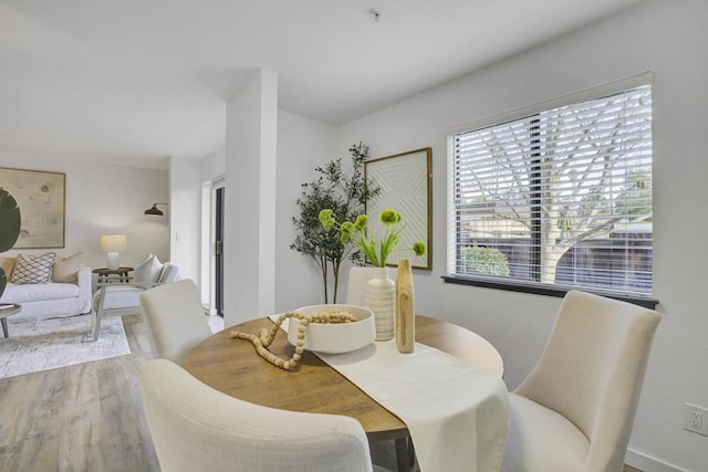 dining area featuring hardwood / wood-style flooring