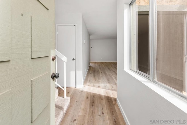 corridor featuring light hardwood / wood-style floors