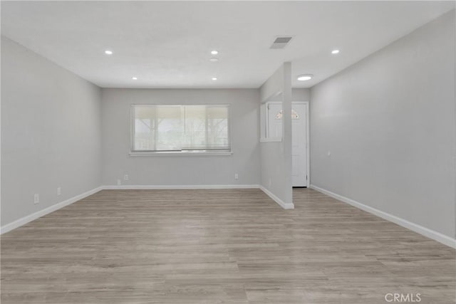 empty room with light wood-type flooring