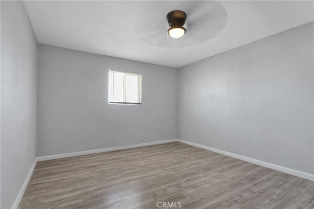 spare room featuring light hardwood / wood-style floors