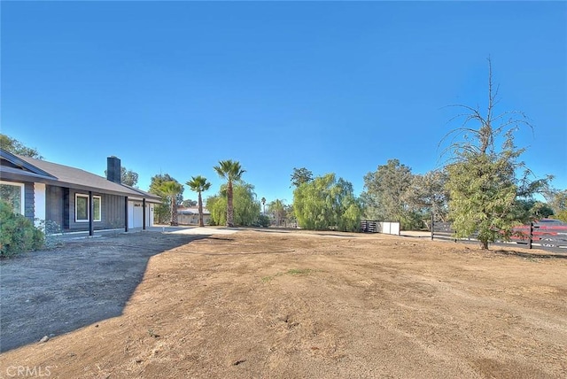 view of yard with a garage