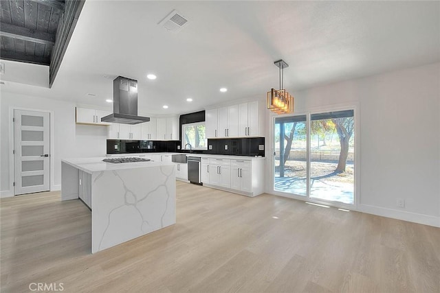 kitchen featuring pendant lighting, a center island, white cabinetry, island range hood, and light wood-type flooring