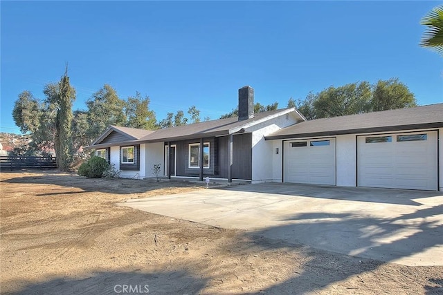 ranch-style home with a garage