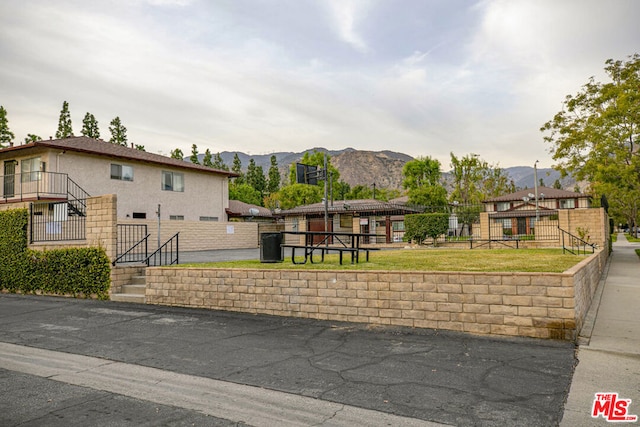 view of front of property with a mountain view