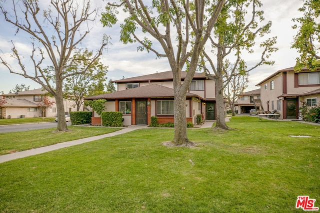 view of front of home with a front yard