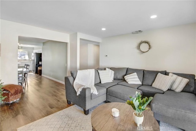 22616 Cardinal St, Grand Terrace, CA 92313 - living room with wood finished floors, baseboards, and recessed lighting