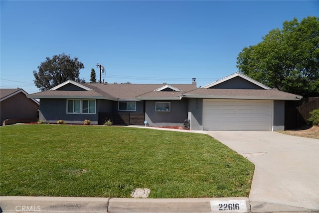 22616 Cardinal St, Grand Terrace, CA 92313 - ranch-style home with concrete driveway, an attached garage, a front lawn, and stucco siding