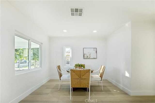 dining space featuring light hardwood / wood-style flooring