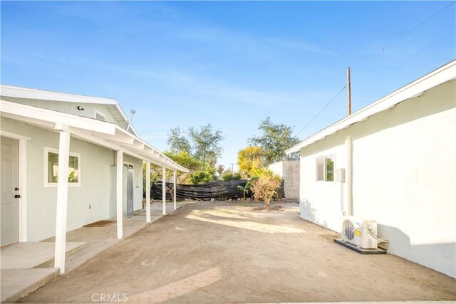 view of patio with ac unit