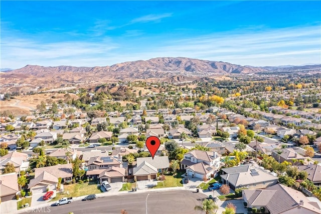 drone / aerial view featuring a mountain view