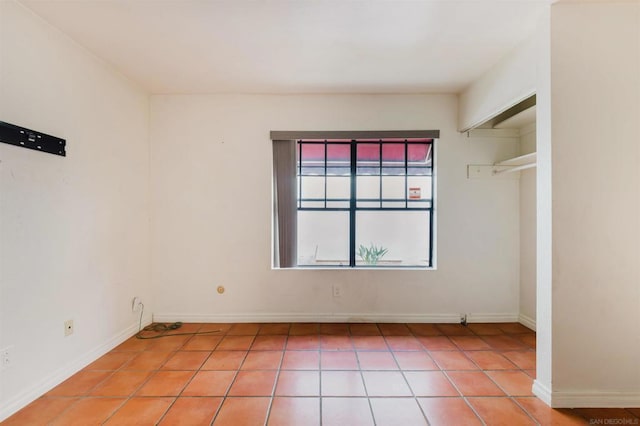 empty room featuring light tile patterned flooring