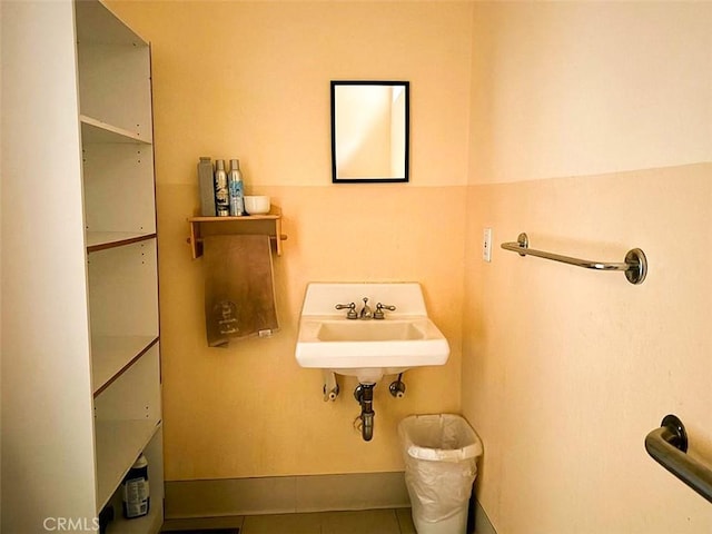 bathroom with sink and tile patterned floors