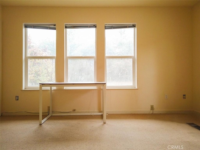 view of carpeted spare room