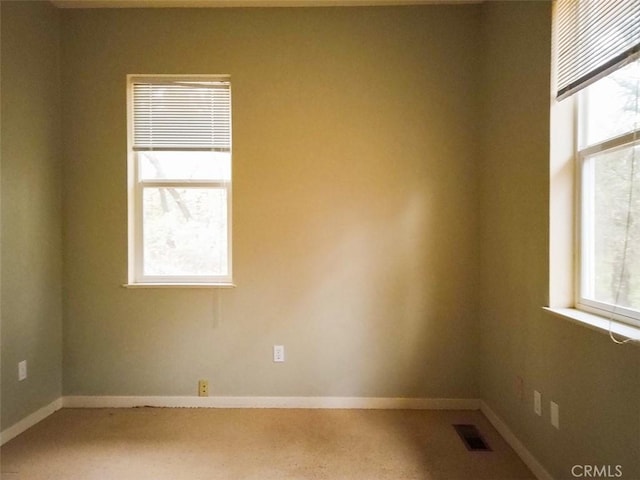 view of carpeted spare room