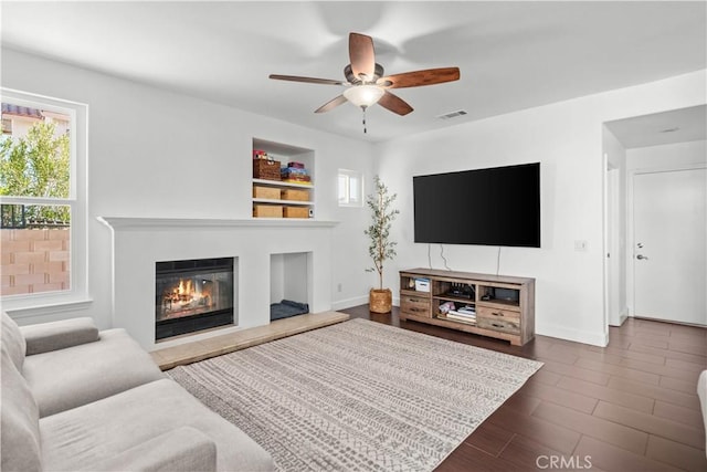 living room featuring ceiling fan