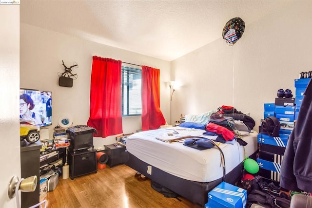 bedroom featuring light wood-type flooring