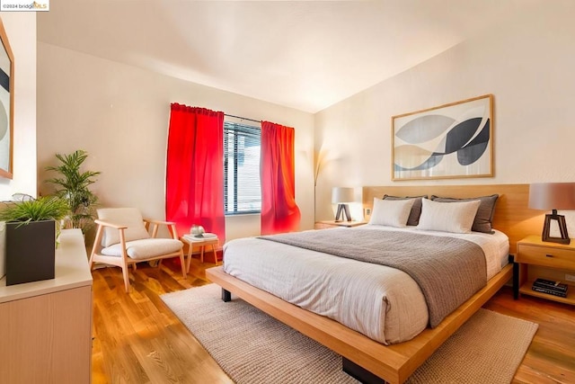 bedroom featuring hardwood / wood-style floors