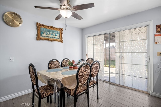 dining space with ceiling fan