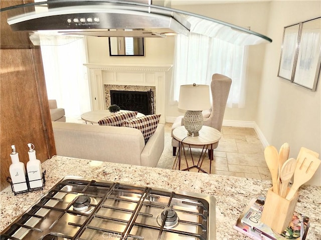 sitting room featuring a premium fireplace